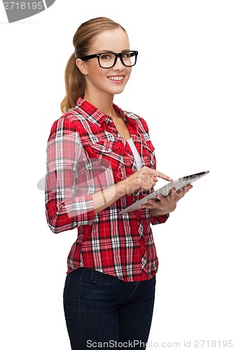 Image of smiling girl in eyeglasses with tablet pc computer