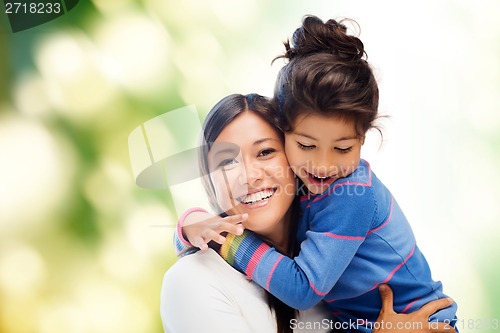 Image of hugging mother and daughter