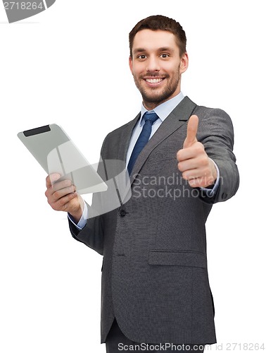 Image of smiling buisnessman with tablet pc computer