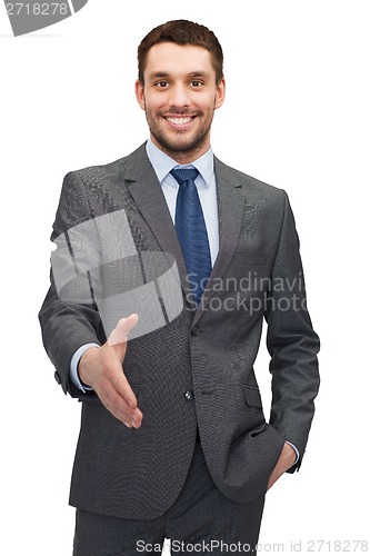 Image of buisnessman with open hand ready for handshake