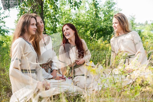 Image of Beautiful women relaxing on nature