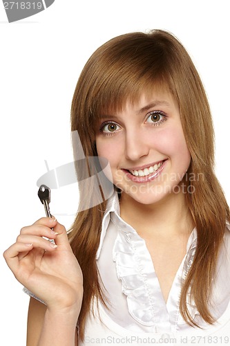 Image of Woman with keys at home