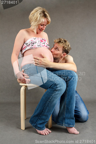 Image of loving happy couple pregnant woman with her husband