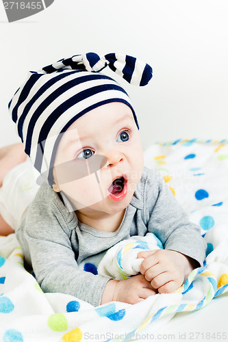 Image of The blue-eyed baby yawning