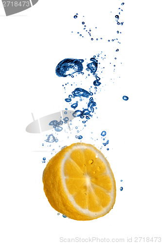 Image of Fresh orange dropped into water with bubbles isolated on white
