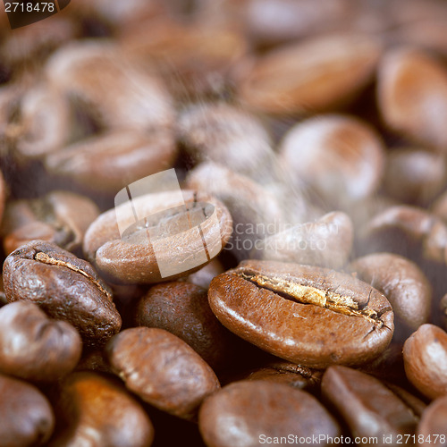 Image of Roasted coffee beans with steam