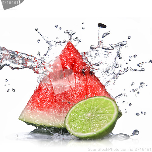 Image of watermelon, lime and water splash isolated on white