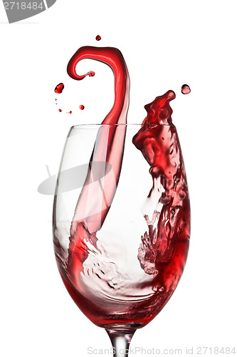 Image of Splash of wine in glass isolated on white