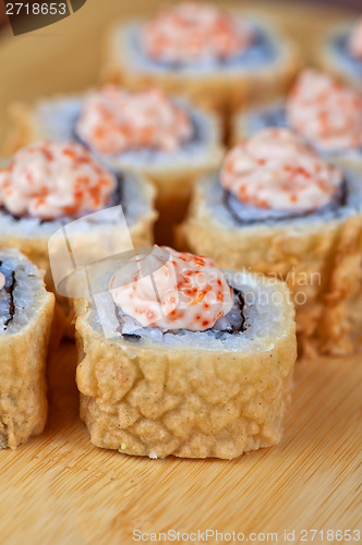 Image of cream cheese and tobico sushi roll