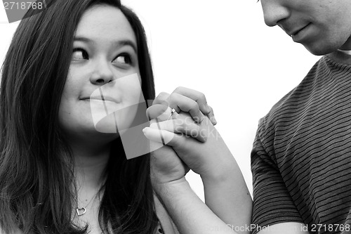 Image of Engaged Couple Holds Hands