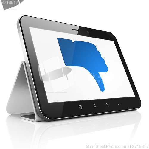 Image of Social media concept: Thumb Down on tablet pc computer