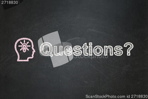 Image of Education concept: Head With Lightbulb and Questions? on chalkboard background