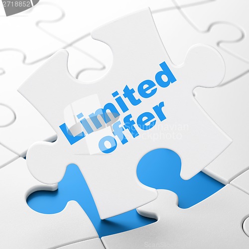 Image of Business concept: Limited Offer on puzzle background