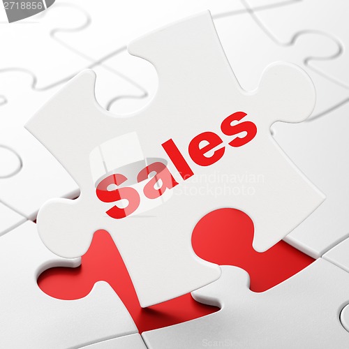 Image of Advertising concept: Sales on puzzle background