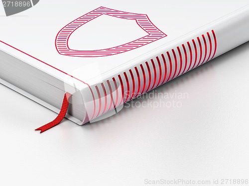 Image of Safety concept: closed book, Contoured Shield on white background
