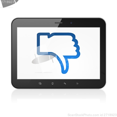 Image of Social media concept: Thumb Down on tablet pc computer
