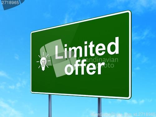 Image of Business concept: Limited Offer and Light Bulb on road sign background