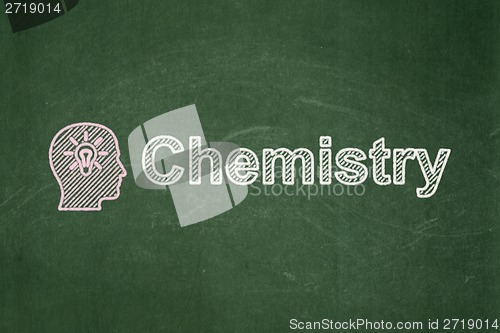 Image of Education concept: Head With Light Bulb and Chemistry on chalkboard background