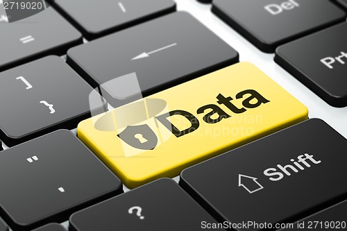 Image of Information concept: Shield With Keyhole and Data on computer keyboard background