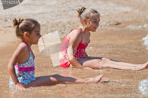 Image of Happy little girls on sealine
