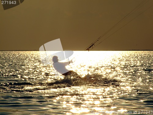 Image of Silhouettes kitesurf on a gulf on a sunseet