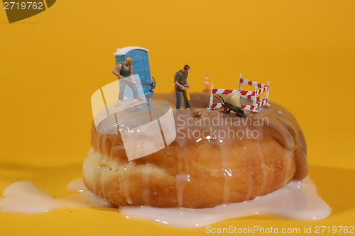Image of Police Officers in Conceptual Food Imagery With Doughnuts