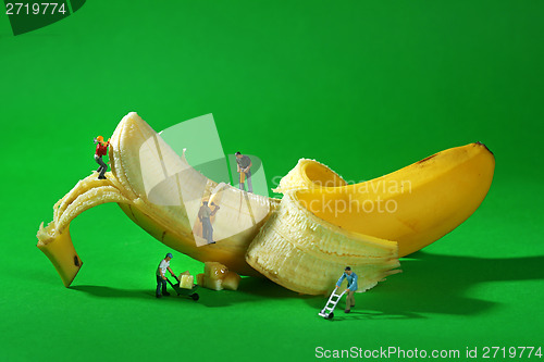 Image of Construction Workers in Conceptual Food Imagery With Banana