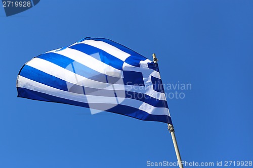 Image of Greek Flag in the Blu Sky 