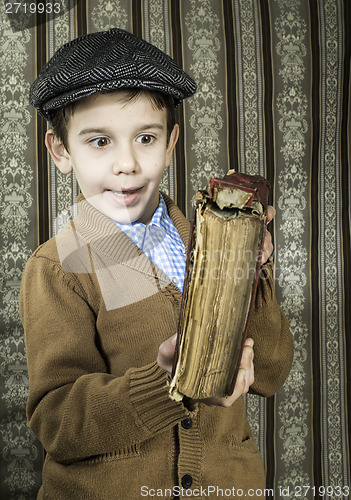 Image of Child with red vintage book