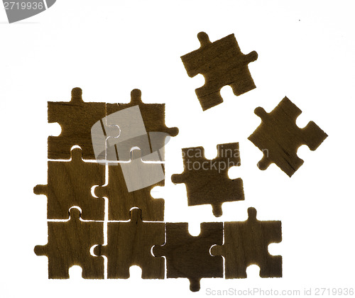 Image of Wooden puzzle and backlight background