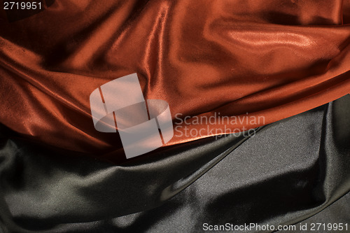 Image of Shiny black and red satin fabric