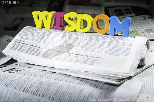Image of Word wisdom on newspaper