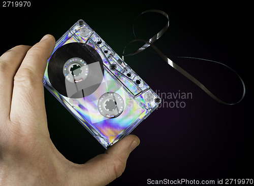 Image of Hand holding vintage cassette tape