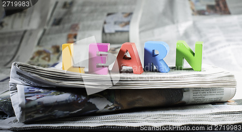 Image of Word learn on newspaper