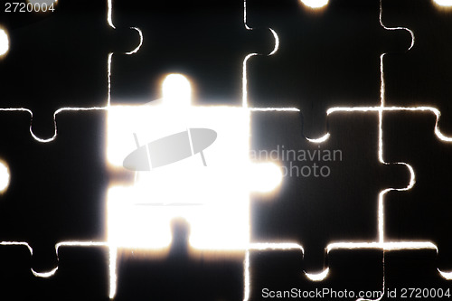 Image of Wooden puzzle and backlight background