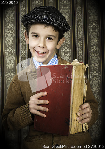 Image of Child with red vintage book