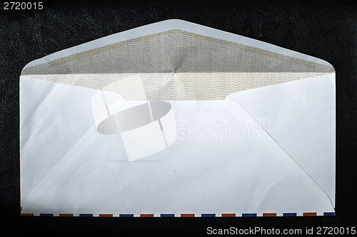 Image of Open envelope on black background