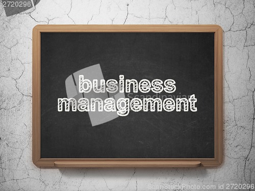 Image of Finance concept: Business Management on chalkboard background