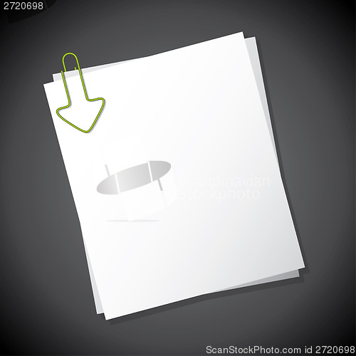Image of Arrow shaped paper clip pointing towards text
