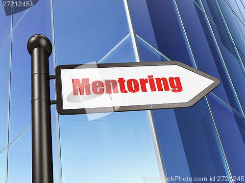 Image of Education concept: sign Mentoring on Building background