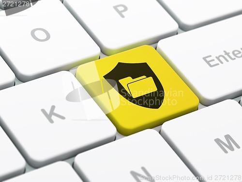 Image of Finance concept: Folder With Shield on computer keyboard background