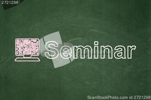 Image of Education concept: Computer Pc and Seminar on chalkboard background