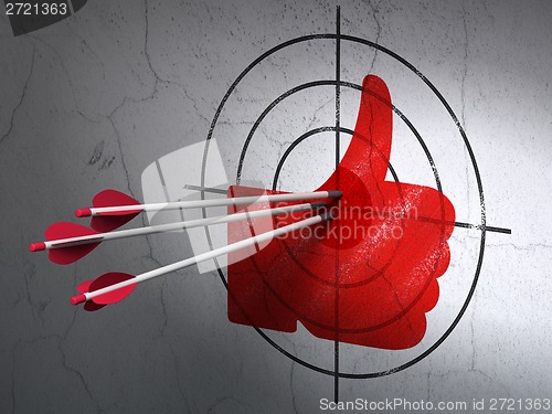 Image of Social network concept: arrows in Thumb Up target on wall background