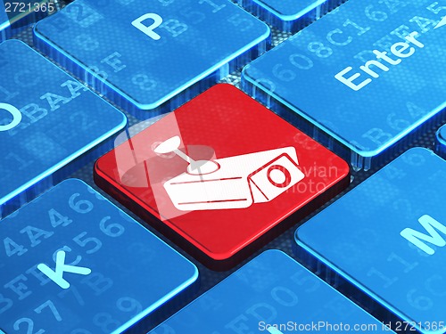 Image of Protection concept: Cctv Camera on computer keyboard background