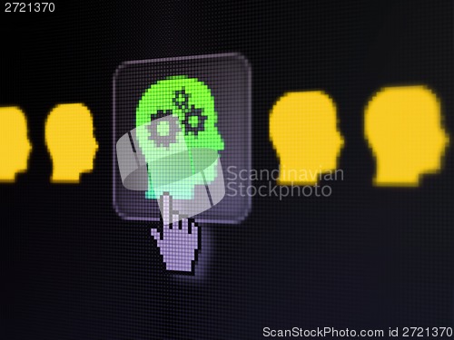 Image of Education concept: Head With Gears on digital computer screen