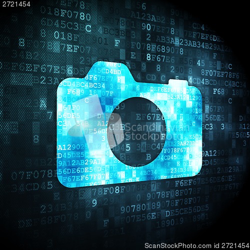 Image of Travel concept: Photo Camera on digital background