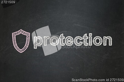 Image of Protection concept: Contoured Shield and Protection on chalkboard background