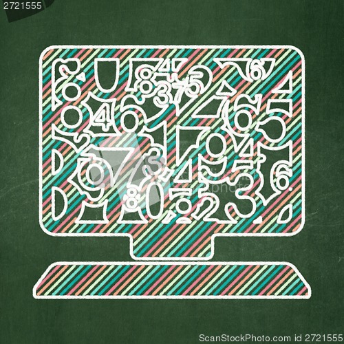 Image of Education concept: Computer Pc on chalkboard background