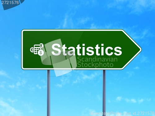 Image of Business concept: Statistics and Calculator on road sign background