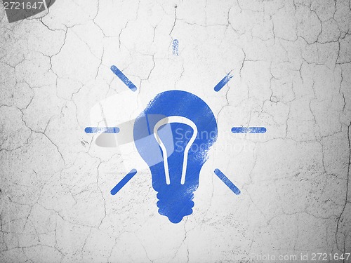 Image of Finance concept: Light Bulb on wall background